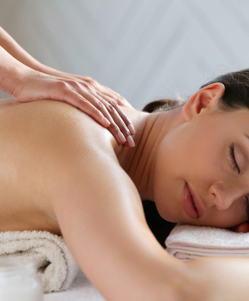 Woman receiving a back massage