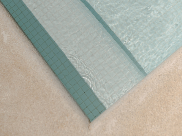 Detail des Randes des Swimmingpools des Eques Petit Resort