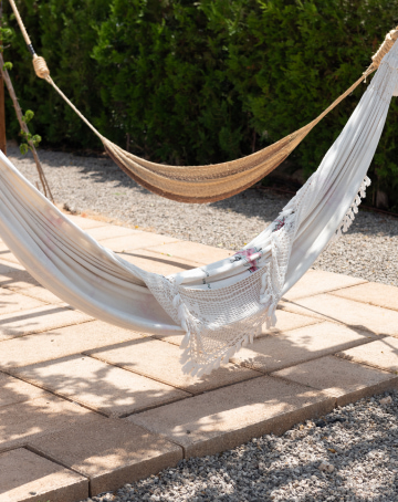 Hammocks hanging in the pool area